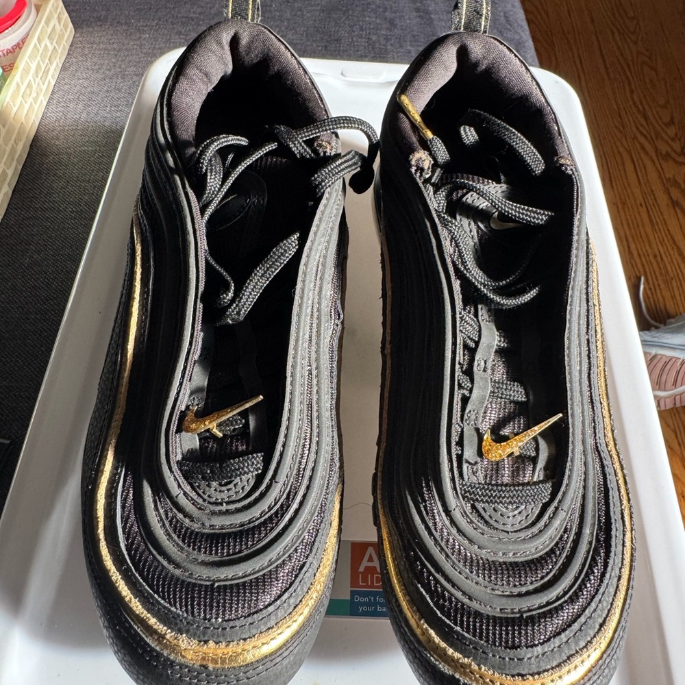 Nike Women’s Black and Gold Low-Top Sneakers